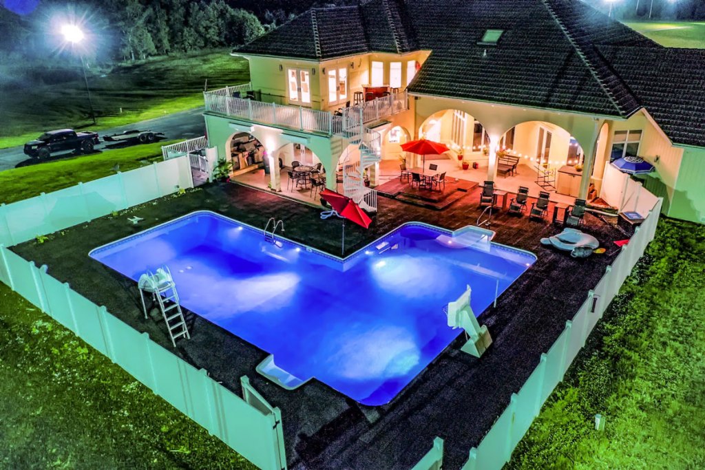 50,000 gallon pool and outdoor dining areas at Missouri based Airbnb. 